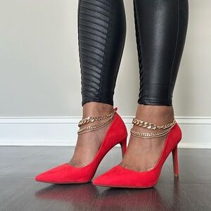 INC red heels with gold chains